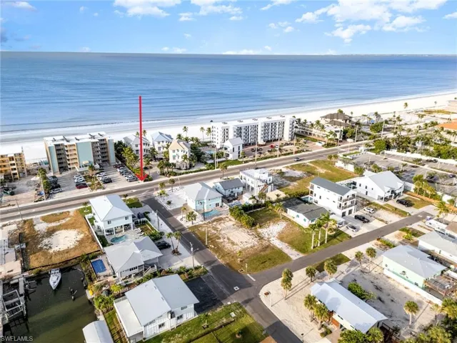Beach access sidewalk across Estero Blvd