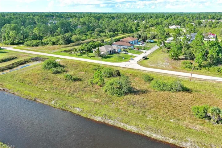 View from above of property featuring a forest