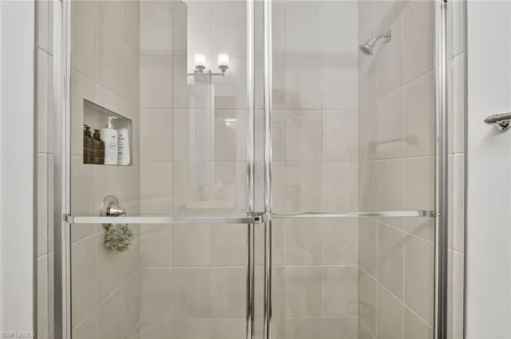 Full bath with a shower stall