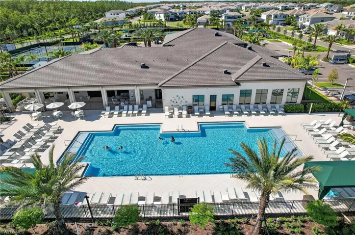 Community pool with a patio area