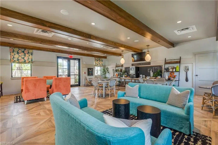Community lobby with recessed lighting and beamed ceiling