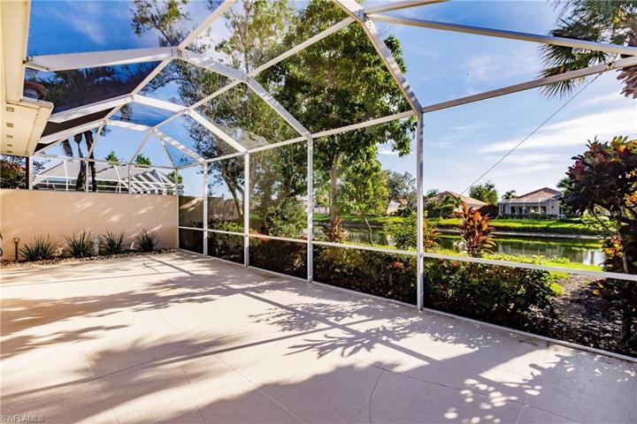 Screened patio with lake views.