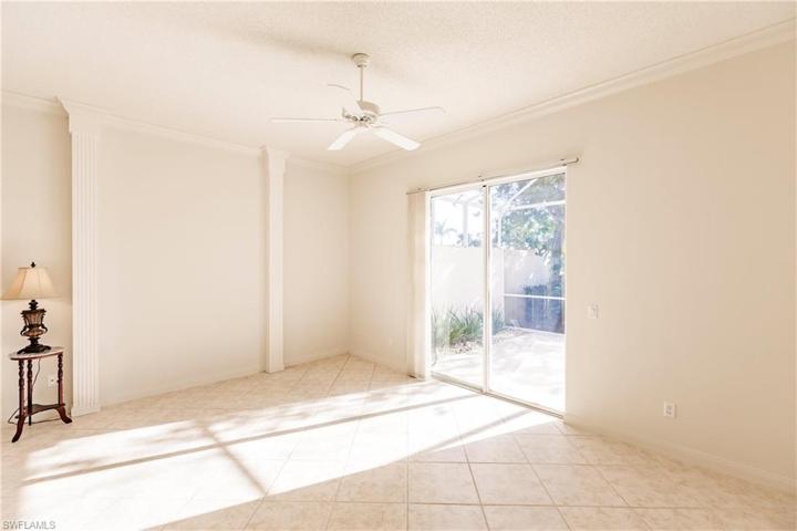 Master bedroom also has tall slider doors to patio allowing tons of natural light in.