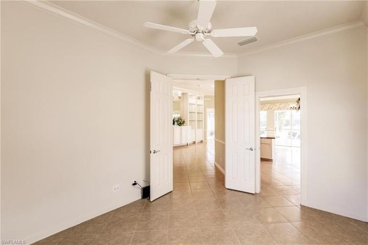 Pocket door from the den to the kitchen.