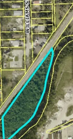 Aerial overview of property parcel outlined Billy’s Creek runs behind