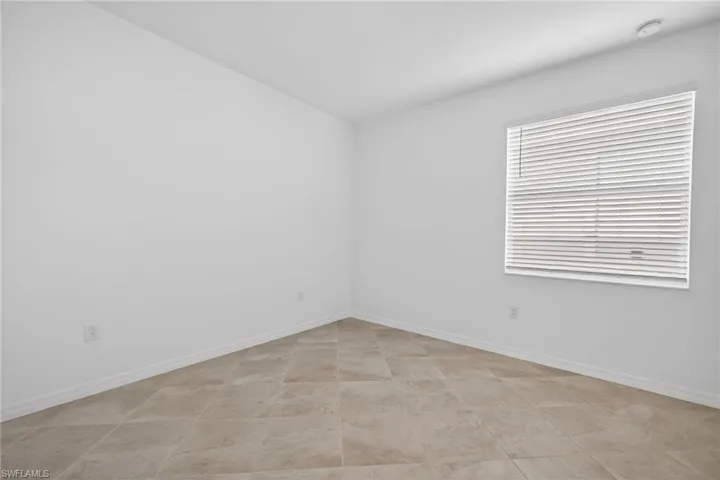 Bedroom featuring baseboards