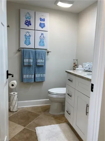 Bathroom with vanity and toilet