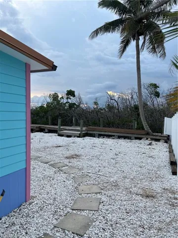 Vibrant exterior siding in hues of blue and pink