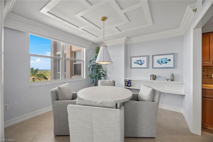 New ceiling detail, chandelier, furniture, decor, and bar shelving 2023