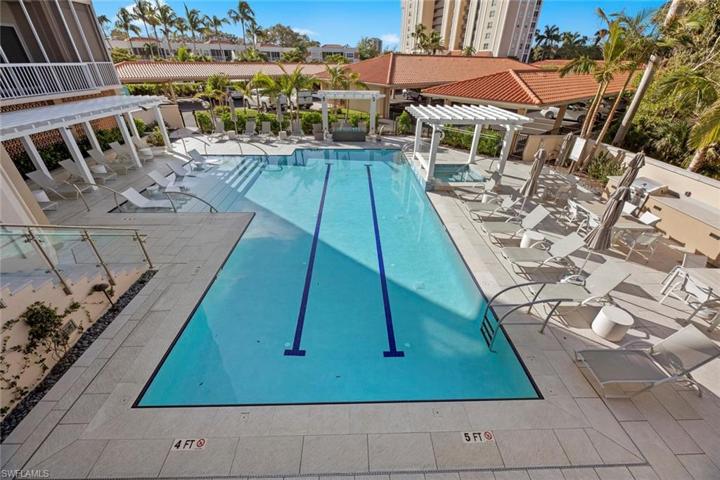Newly built Knife Edge Pool, Decks, Fire pit and Pergola. Lap Pool seamlessly integrated into Tropical Oasis. Other features include a fire pit, and pergola covered spa.