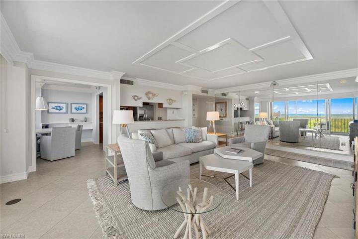 Welcoming open concept greets visitors in style! New furniture, decor, rug, ceiling detail, paint 2023