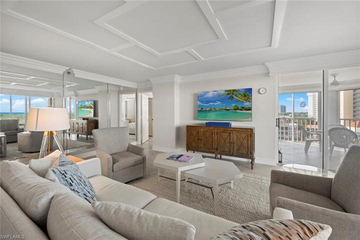 Light, Bright Gulf View Retreat! Step into this Gulf View paradise! Sleek and comfortable. Living Room features custom mirrors to reflect the magical view. New ceiling detail, paint, furniture, and decor 2023
