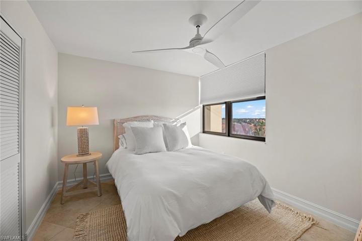 3rd Bedroom features Queen Size Bed and City Views. New paint, ceiling fan, rug, decor, and bedding 2023