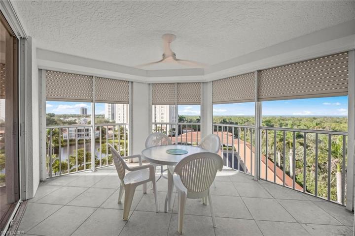 Corner lanai has ELECTRIC STORM SHUTTERS. New paint, ceiling fan, and furniture 2023