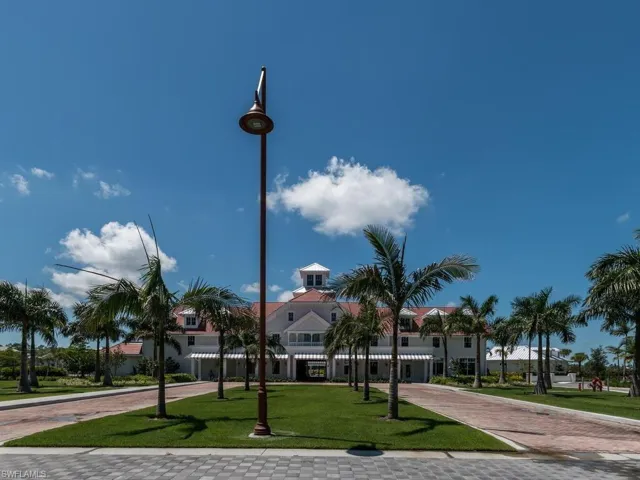 View of community featuring a lawn