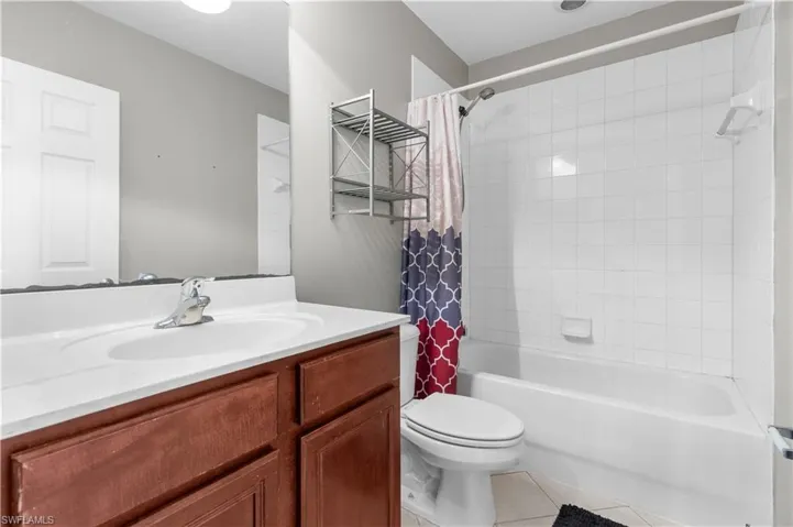 Full bathroom with toilet, shower / bath