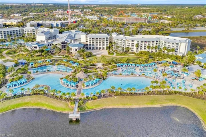 Bird's eye view of a large body of water and apartment complex