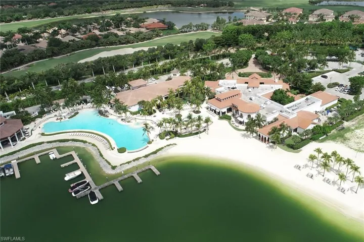 Birds eye view of property featuring the community pool, Blue Water Grille, Fitness-Spa Complex & the Beach Club