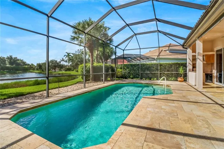 Another view of the pool with a water view