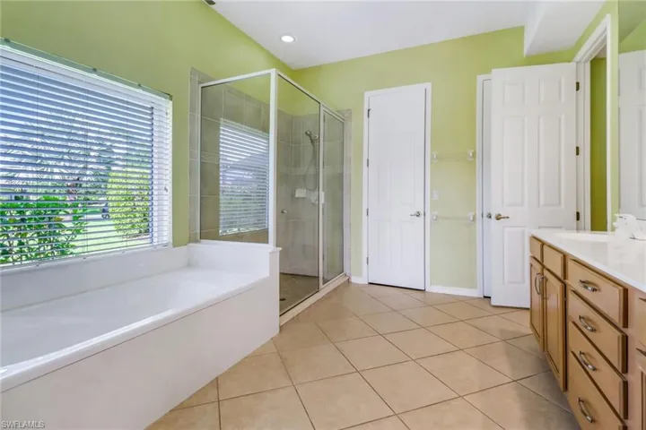 Primary Bathroom with separate shower and bathtub.