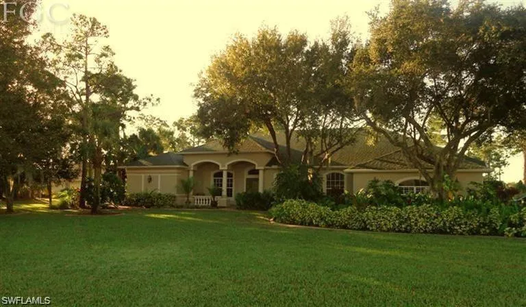 View of front of house featuring a yard