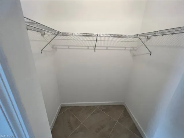 Master Bedroom walk in closet #1