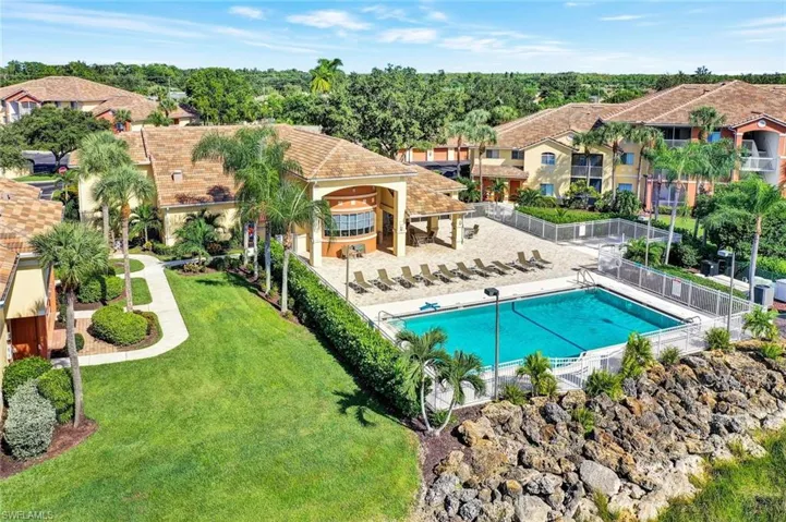 View of community pool and clubhouse