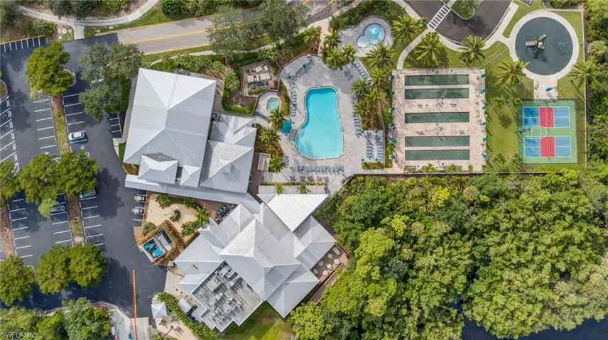 The River Club with resort pool, fitness center, river access, bocce courts and restaurant.