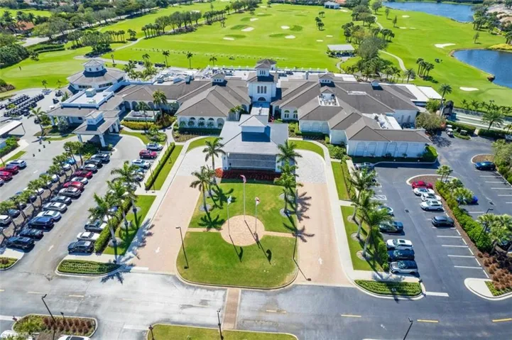 Bird's eye view featuring view of golf course, a water view, and a residential view