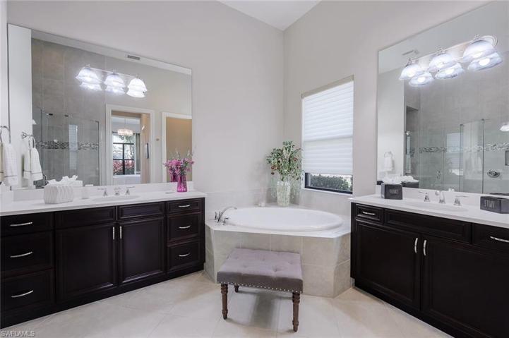 Main bath - with two vanity areas, garden soaking tub. Private watercloset. Two spacious and well organized closets.