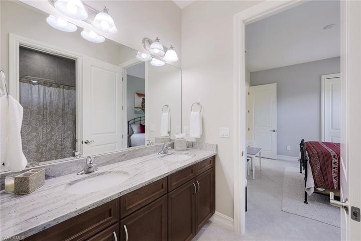 Jacks and Jill Bath - Shower/water closet area has a door for privacy.