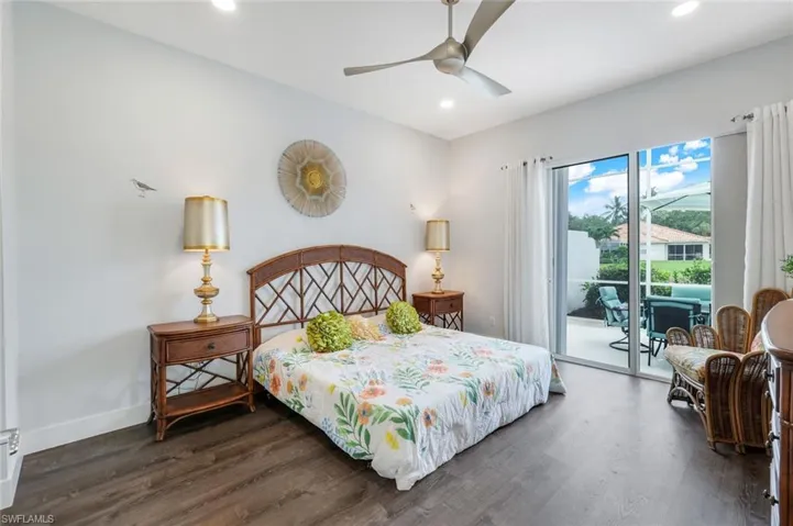 Master Bedroom with access to outside, finished floors, recessed lighting, baseboards, and ceiling fan