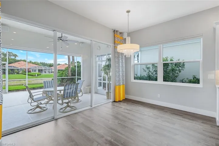 Dining area, ceiling fan, and baseboards