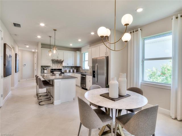 Photos are from the furnished model. Options for this home may vary
