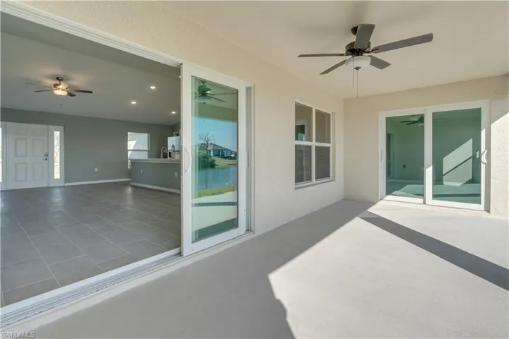 View of patio with a ceiling fan