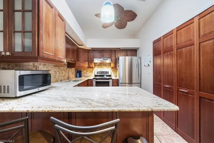 1040  Oak Forest  DR, Naples, FL 34104