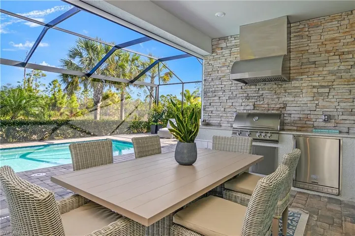 Priced to SELL! This pool/spa home includes outdoor kitchen, remote kevlar storm shades, whole home generator, and your own private oasis! Also sold FURNISHED!!
