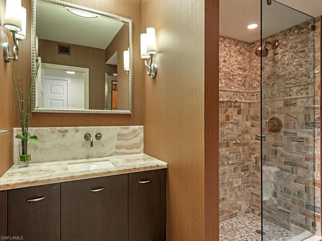 Full bath featuring vanity and a walk in shower