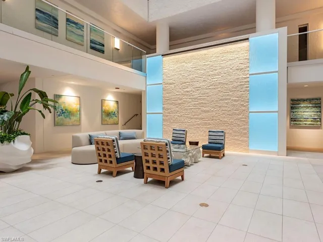 Atrium lobby featuring a towering ceiling