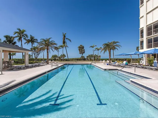 Community pool featuring a patio area