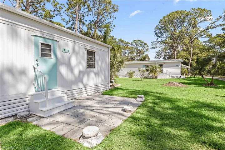 Side patio - an additional space to enjoy and a secondary entrance to this beautiful home!