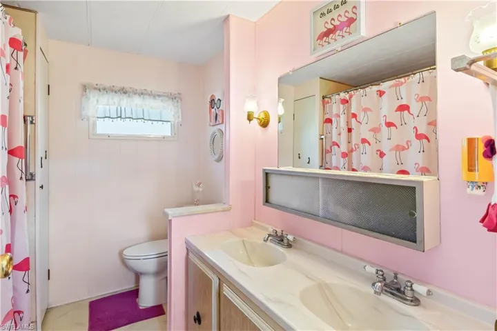 Fl FL Flamingo!  A fun and functional bathroom with double sinks and that abundant charm found throughout the home!