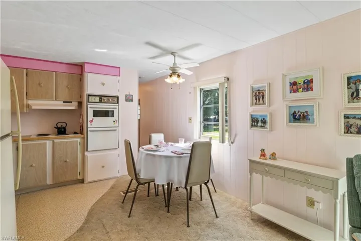 Dining area with plenty of room for large hutch!
