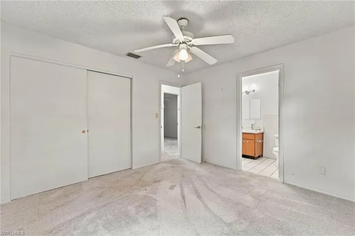 Recessed lighting, ceiling fan, and sliding closet doors
