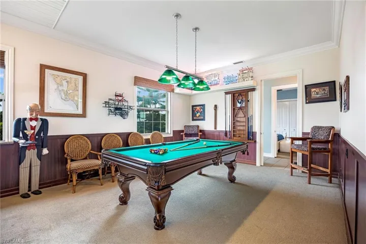 Rec room featuring crown molding, carpet, and billiards
