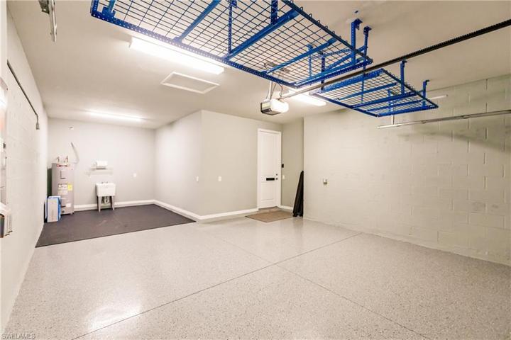 2+ golf cart garage with overhead shelving