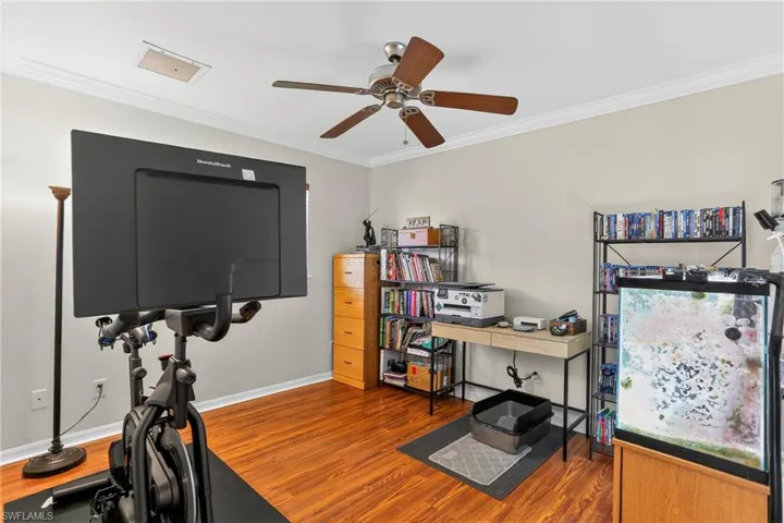 Den/office with crown molding & laminate floors
