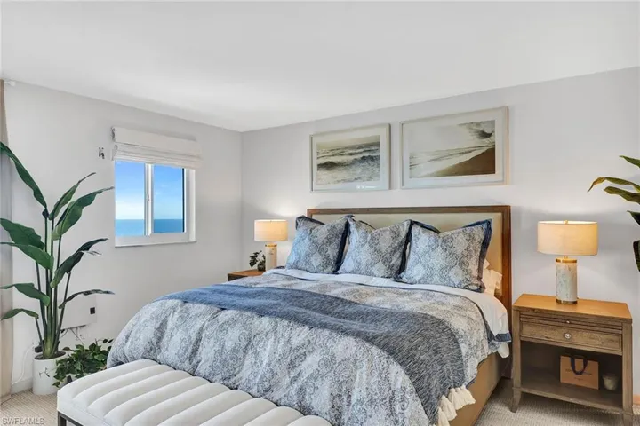 A window offers mesmerizing views and lets in the soothing sound of the surf