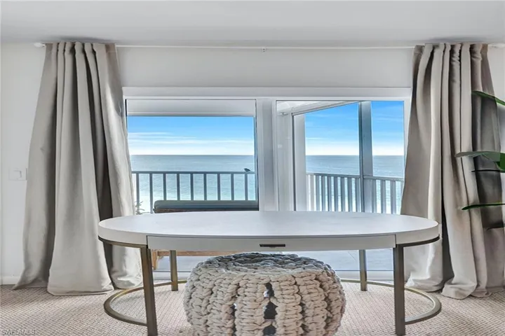 Spacious enough for a full wall of closets and a desk with a view!