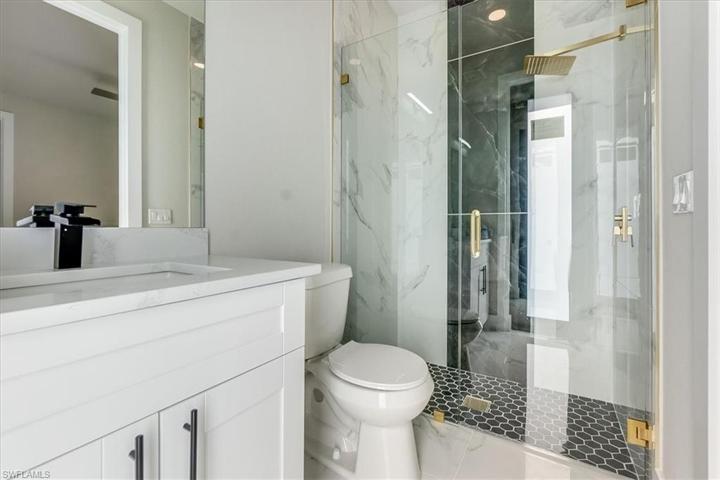 Private bathroom in bedroom.